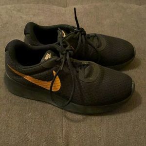 Black and Gold Nike Sneakers size 8